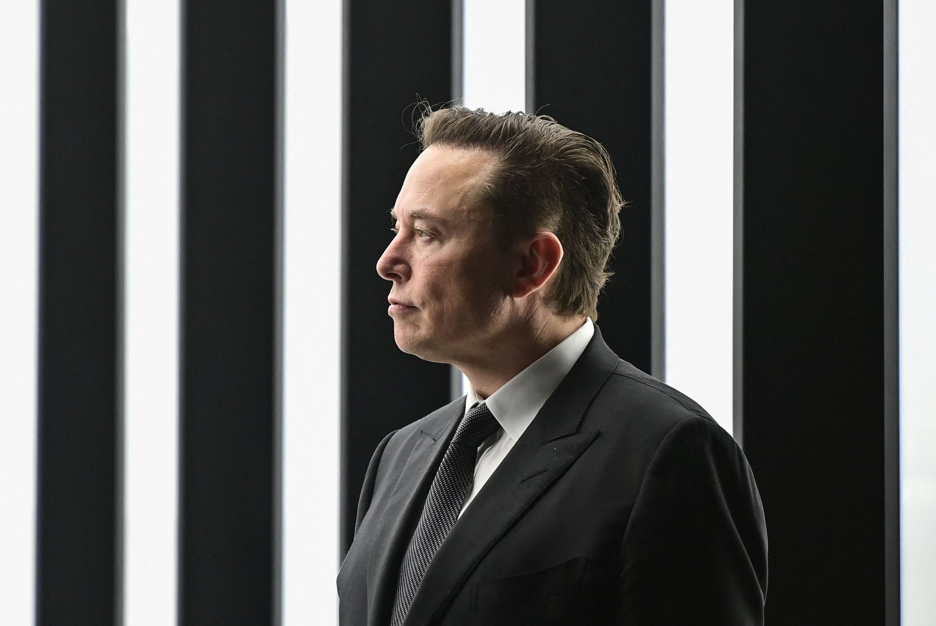 Tesla stock surges as Elon Musk buys $1 billion in shares