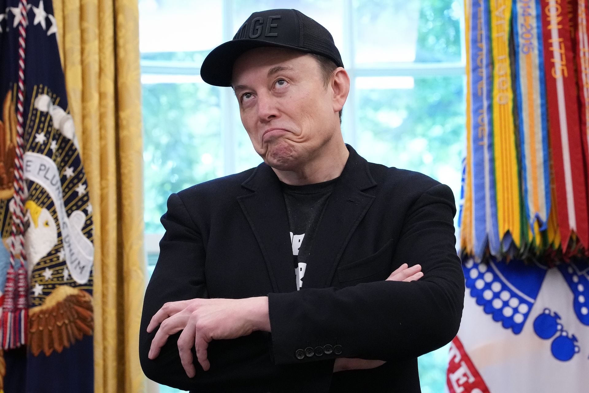 elon musk shrugging