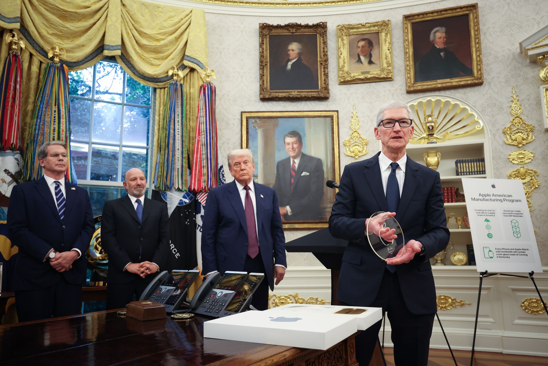 Tim Cook stands in the Oval Office in front of Trump, Vance, Lutnick, and Bessent