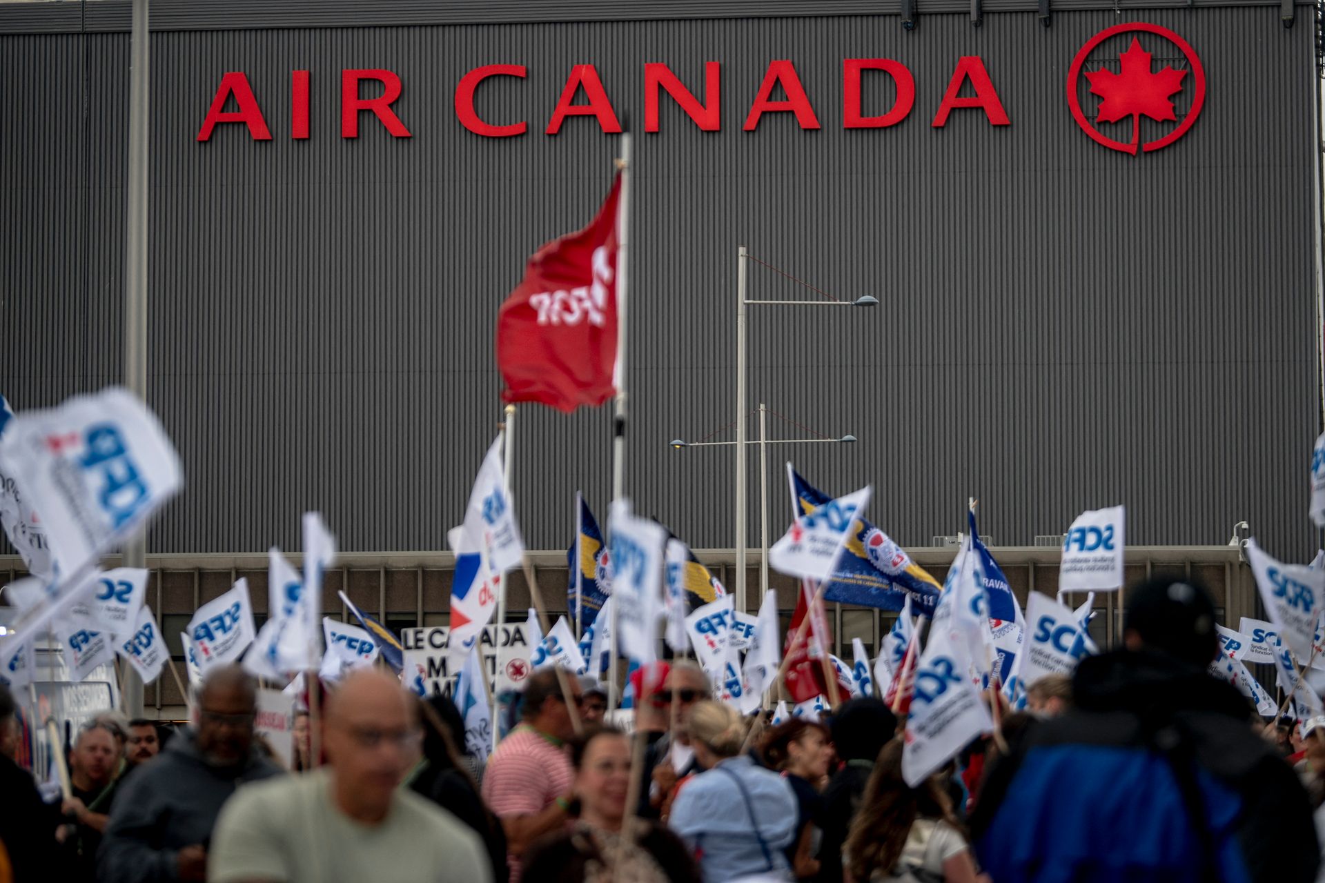 Air Canada pulls profit forecasts as striking flight attendants defy return-to-work order