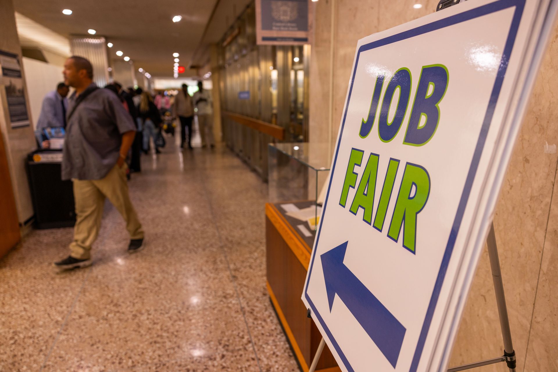 A new jobs report shows modest growth — but with white-collar layoffs accelerating