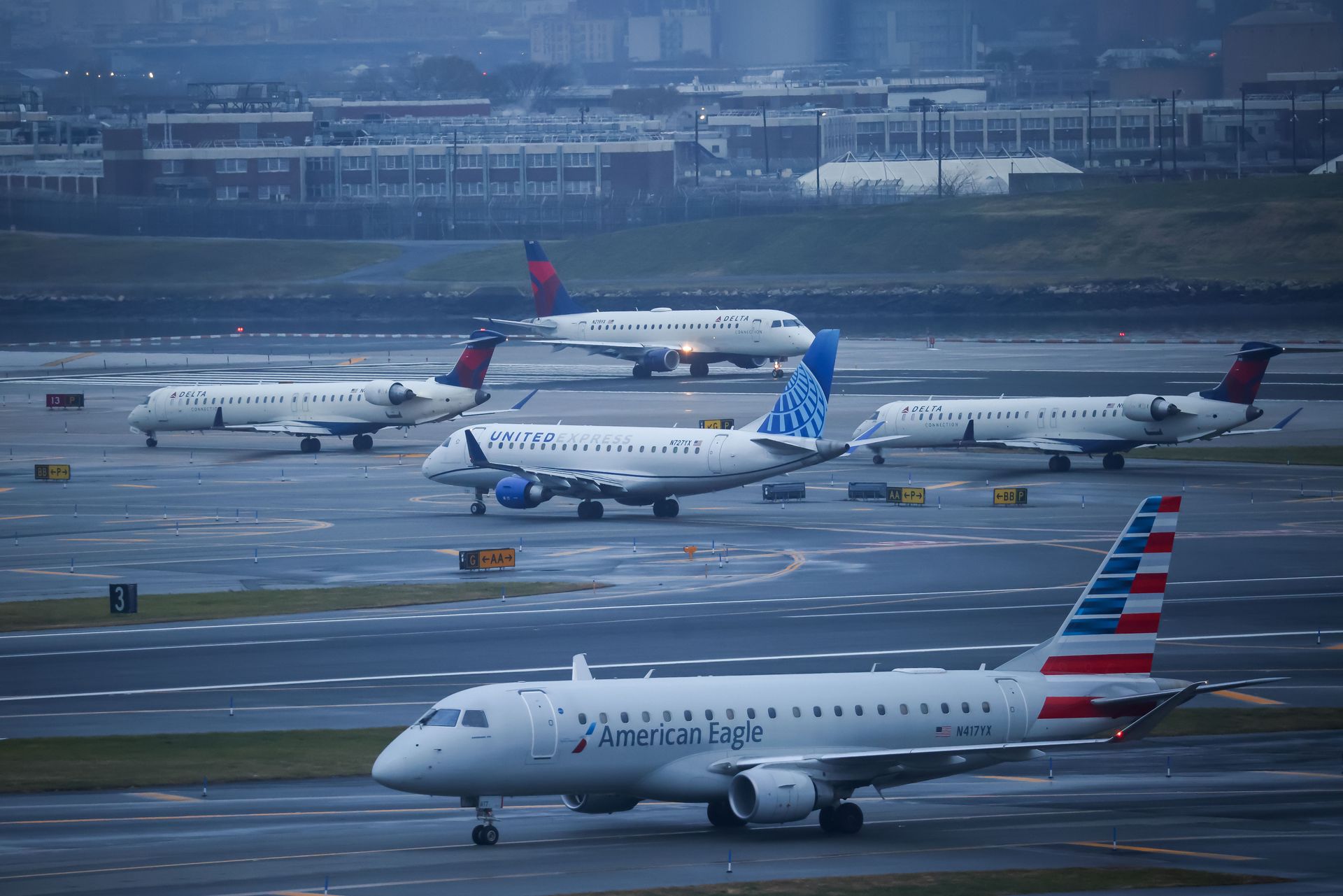 Airlines are cutting flights and raising fees as jet fuel nears $5 a gallon
