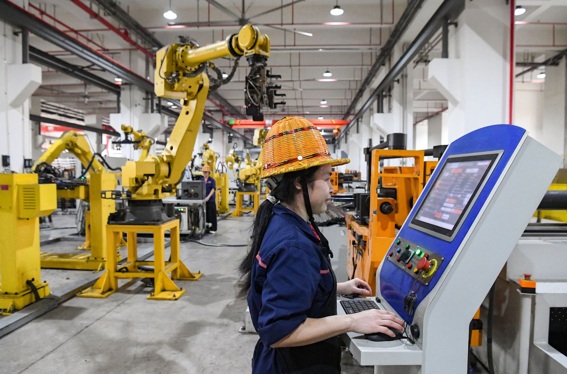 China's factory activity returns to growth in June on AI export demand