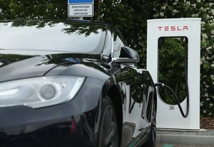 Tesla stock gets a downgrade as Elon Musk gets even more political