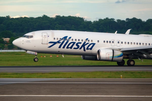 Alaska Air swung to a loss on surging fuel costs but expects a summer rebound